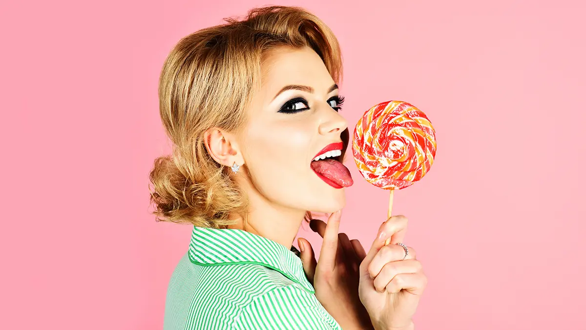 licking lollypop